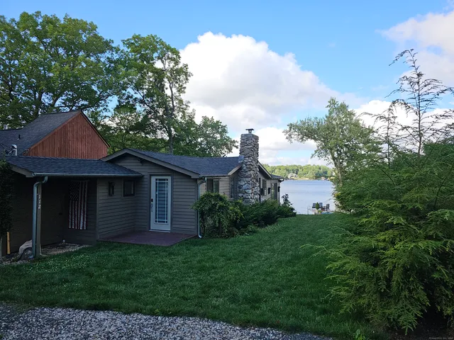 a view of backyard with green space