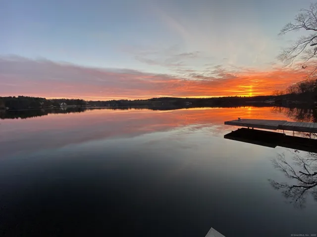 a view of a chairs and table in patio