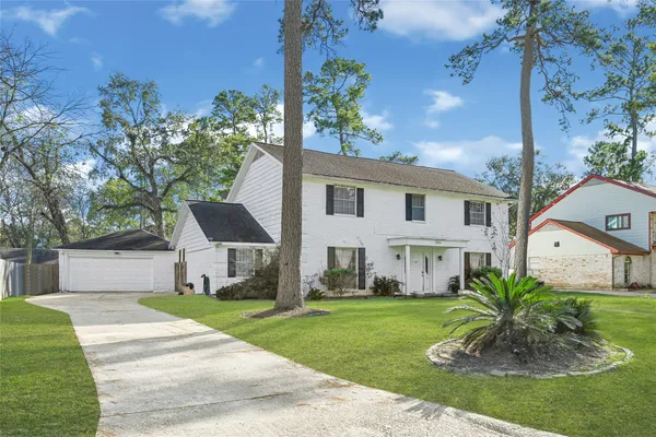 a house view with a garden space