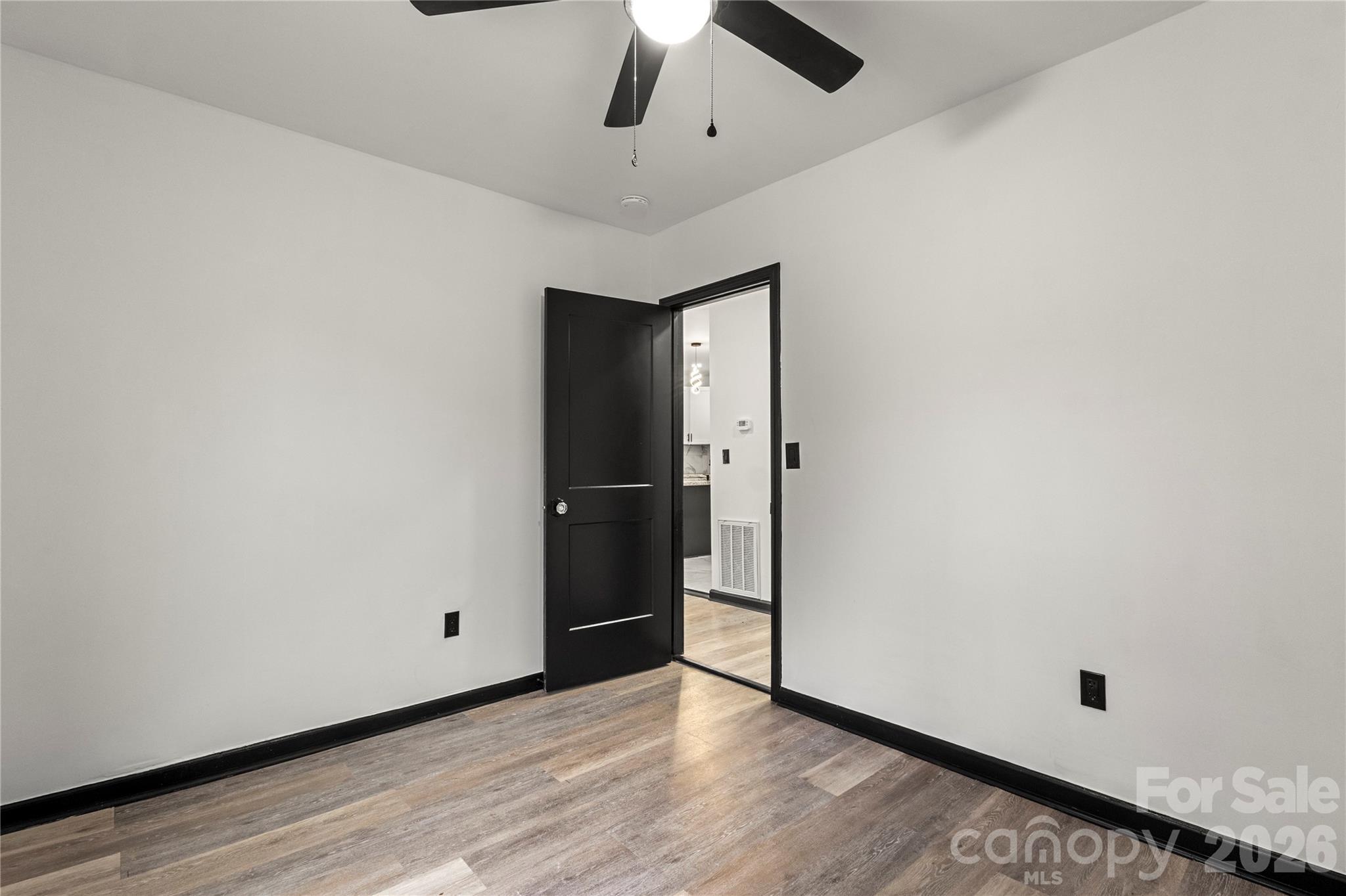 110 Courtland Street Chester, SC 29706 - Photo 10 of 22 wooden floor in an empty room