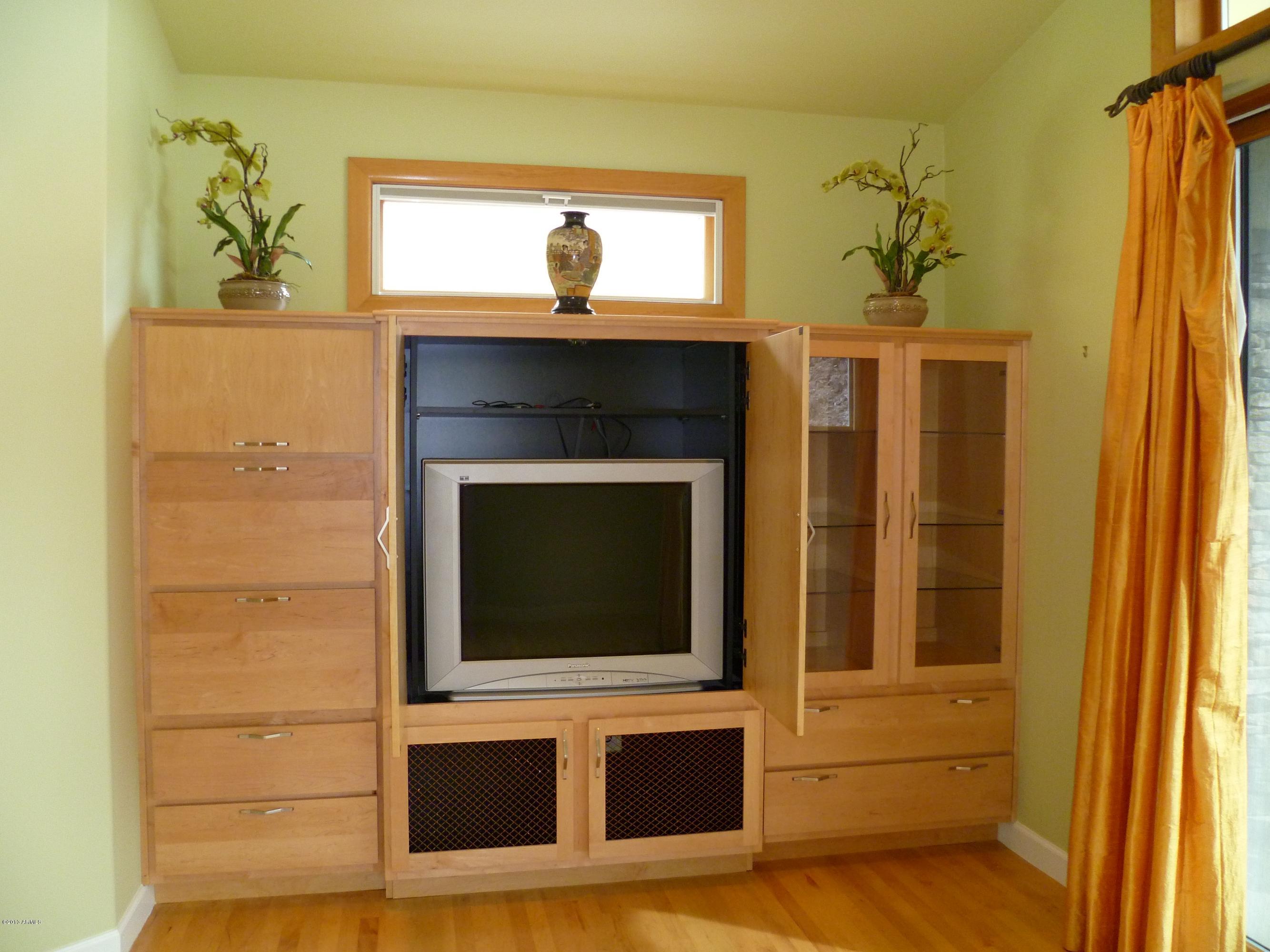 1912 East Mountain View Road Phoenix, AZ 85020 - Photo 34 of 81 Master bdrm built-in tv cabinetry