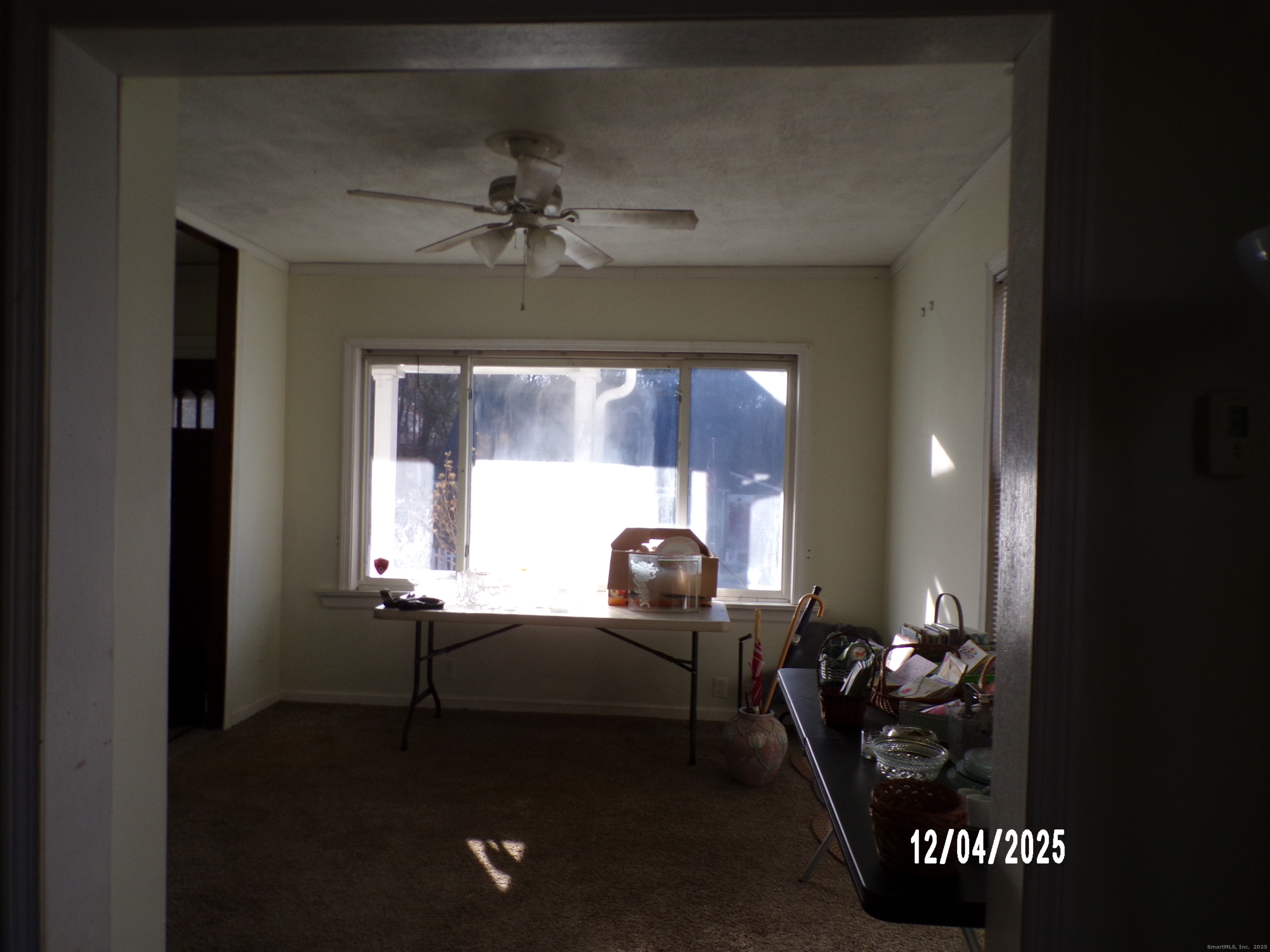 103 Myrtle Avenue Ansonia, CT 06401 - Photo 18 of 35 a living room with furniture and a chandelier