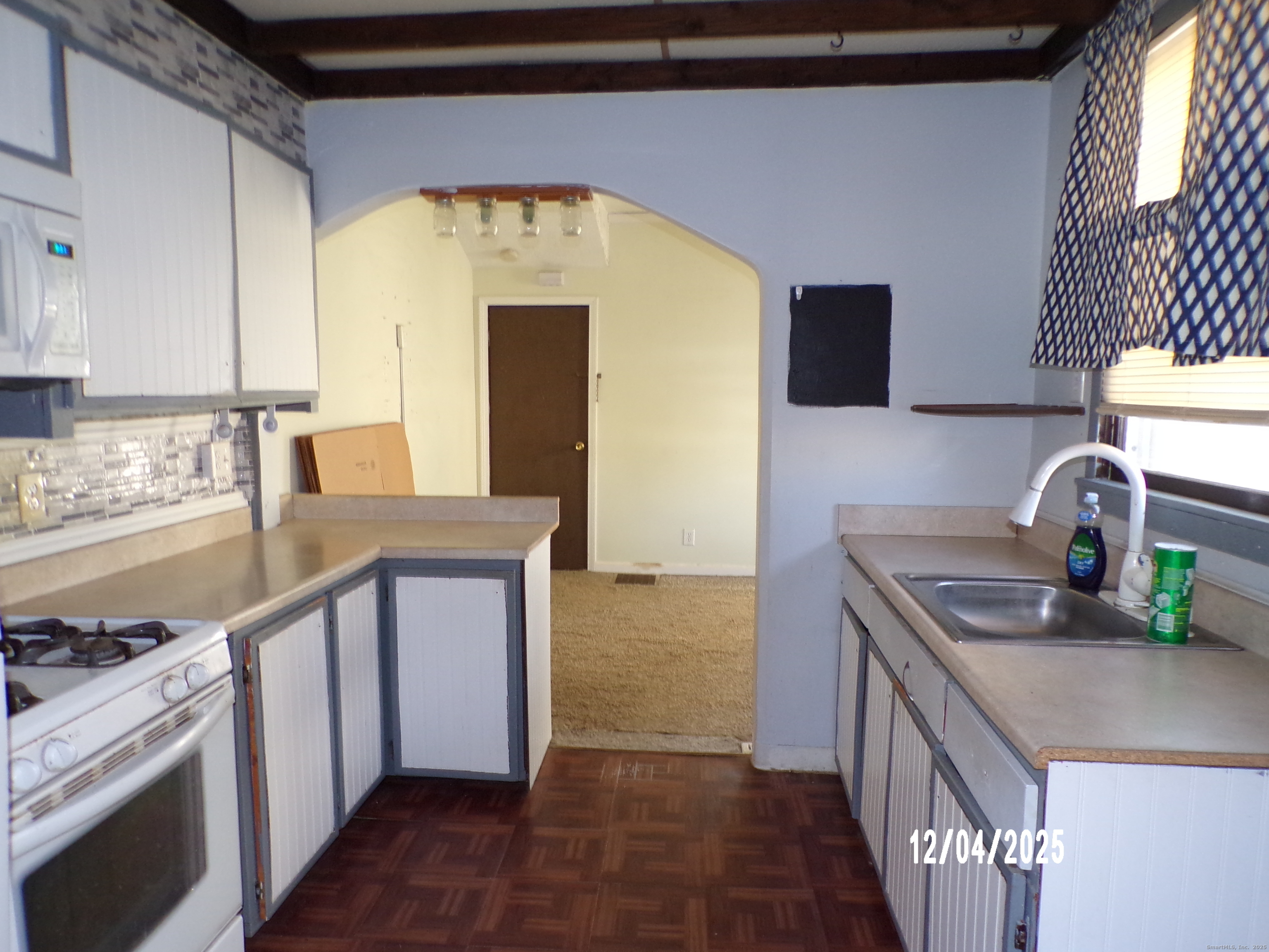 103 Myrtle Avenue Ansonia, CT 06401 - Photo 21 of 35 a kitchen with stainless steel appliances granite countertop a sink and a stove
