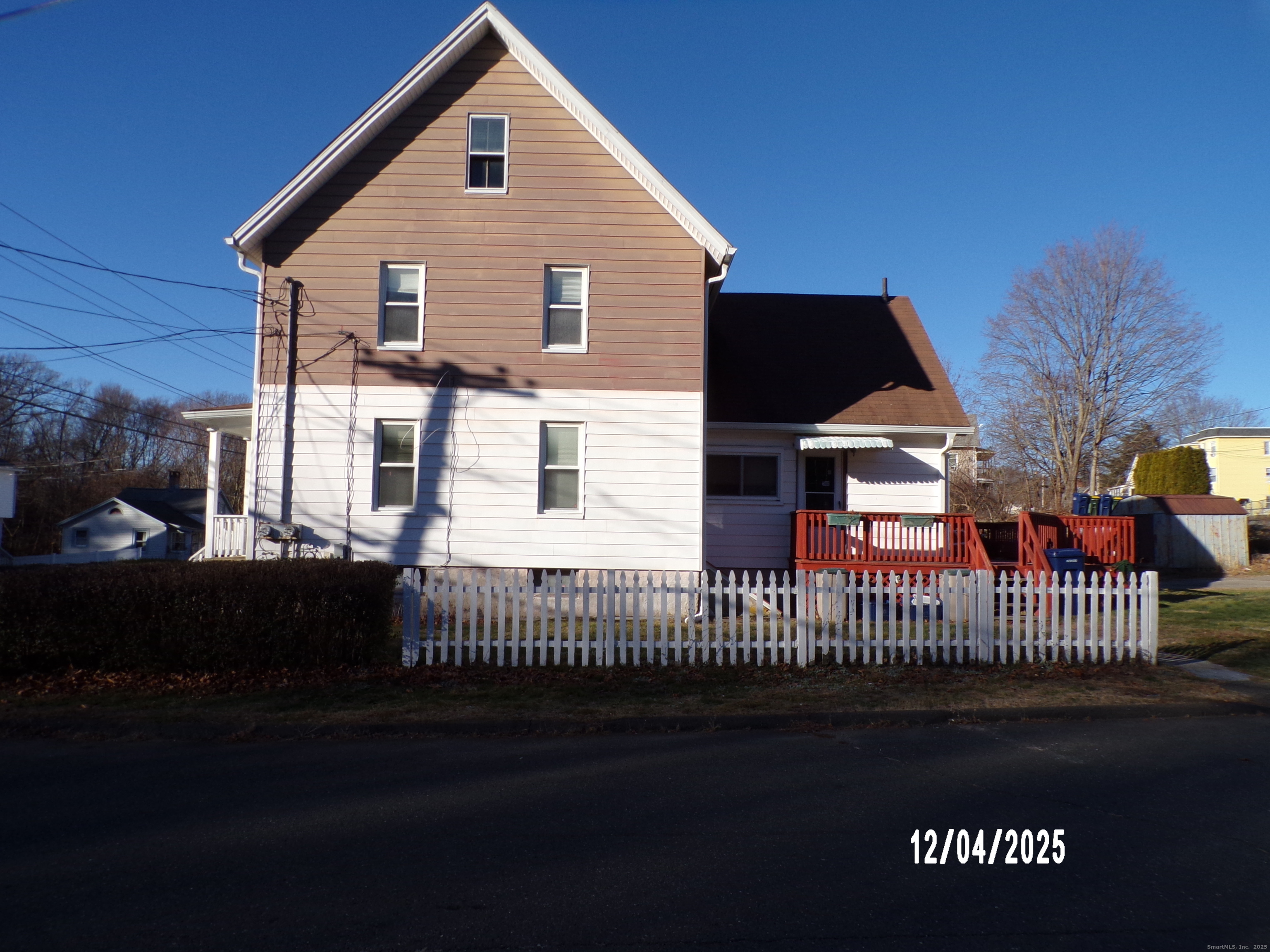 103 Myrtle Avenue Ansonia, CT 06401 - Photo 3 of 35 a front view of a house with a yard