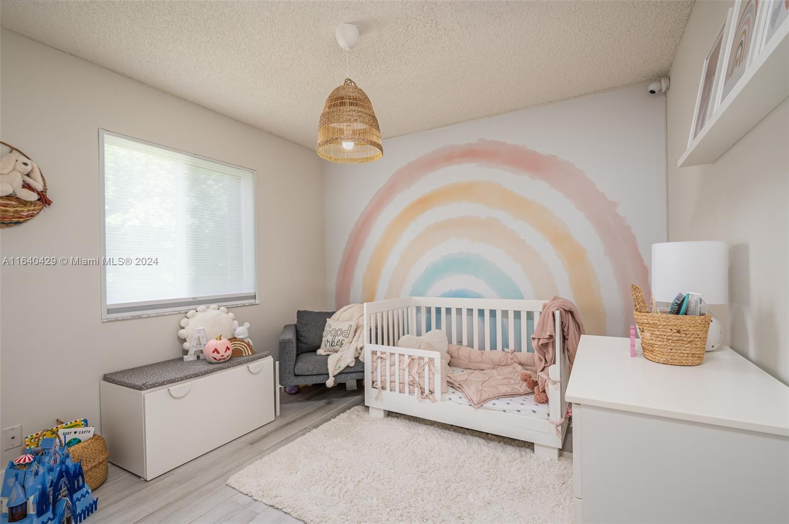 The Ridges Weston, FL 33331 - Photo 17 of 27 a spacious bedroom with a bed and a window