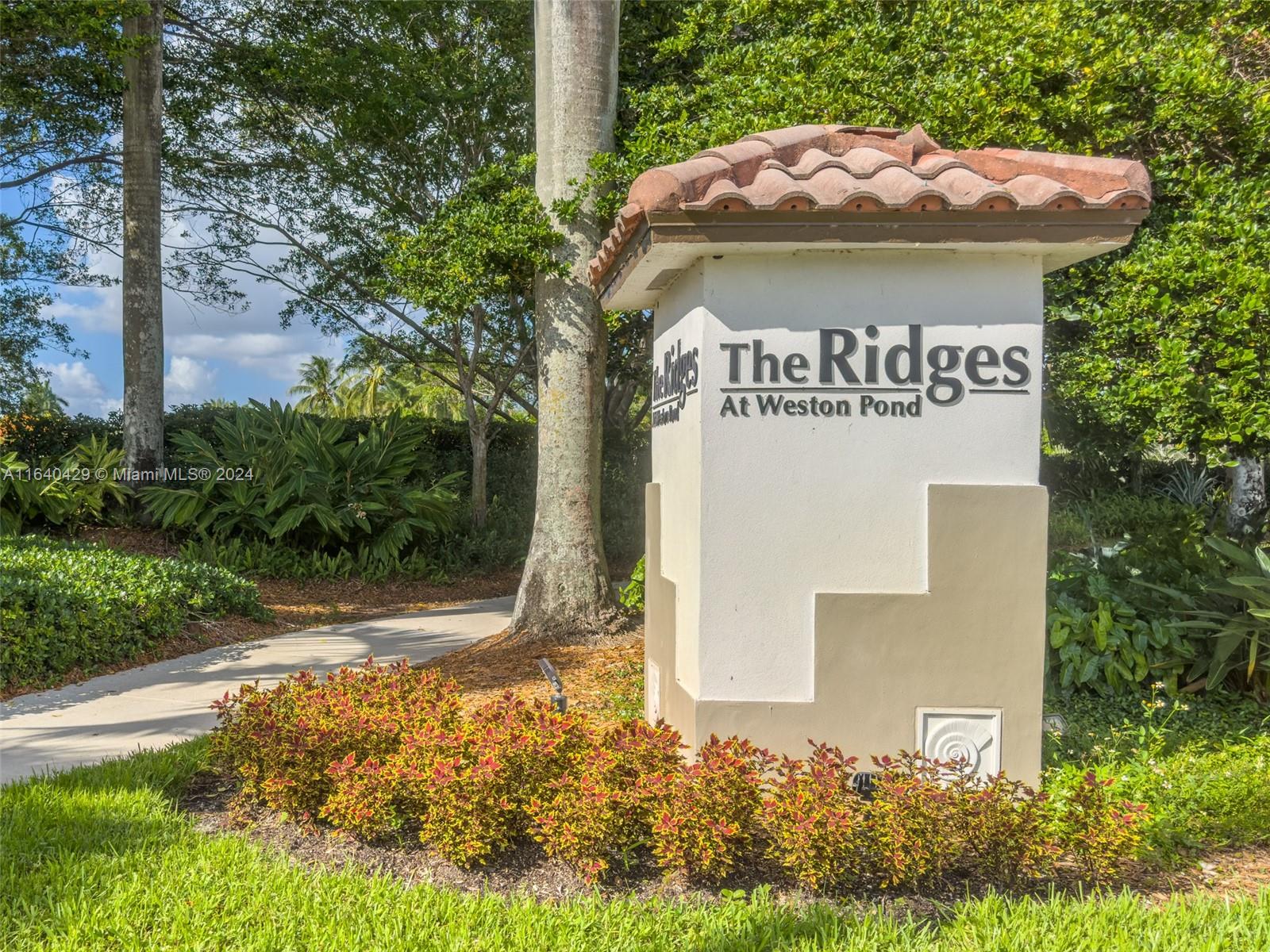 The Ridges Weston, FL 33331 - Photo 23 of 27 a view of a house with a yard