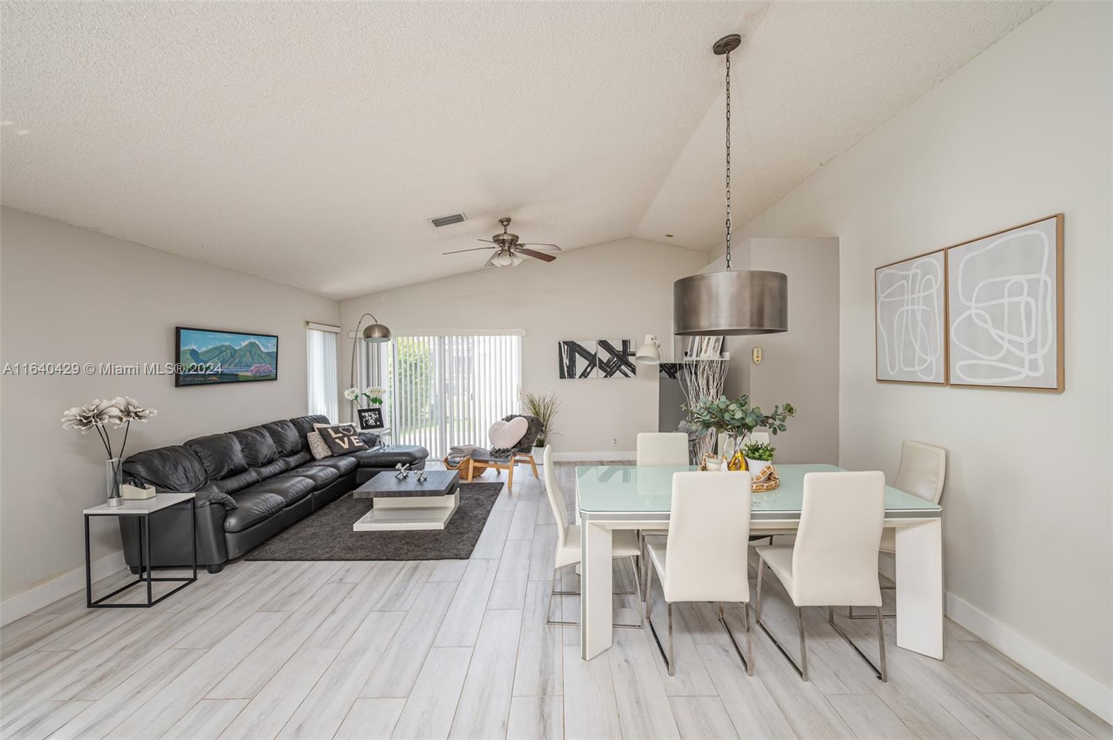The Ridges Weston, FL 33331 - Photo 6 of 27 a living room with furniture and wooden floor