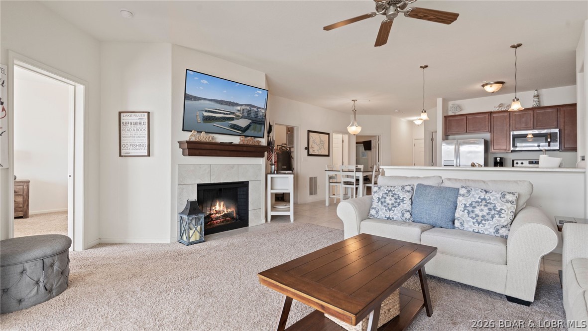 64 Knox Road, Unit N105 Rocky Mount, MO 65072 - Photo 13 of 63 Living room with fireplace