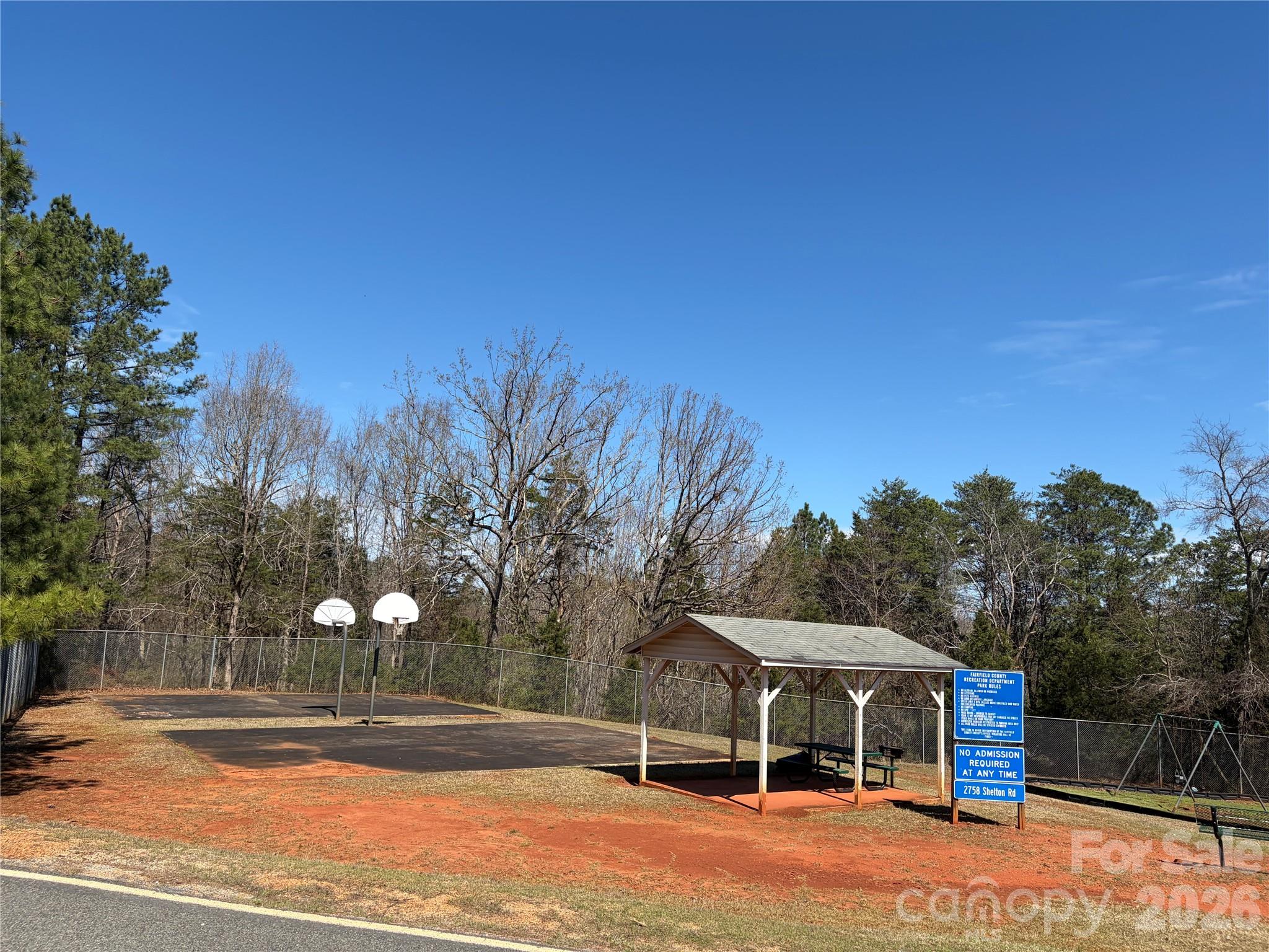 12.68-acre 99 Road Blair, SC 29015 - Photo 43 of 44 a front view of a house with a yard