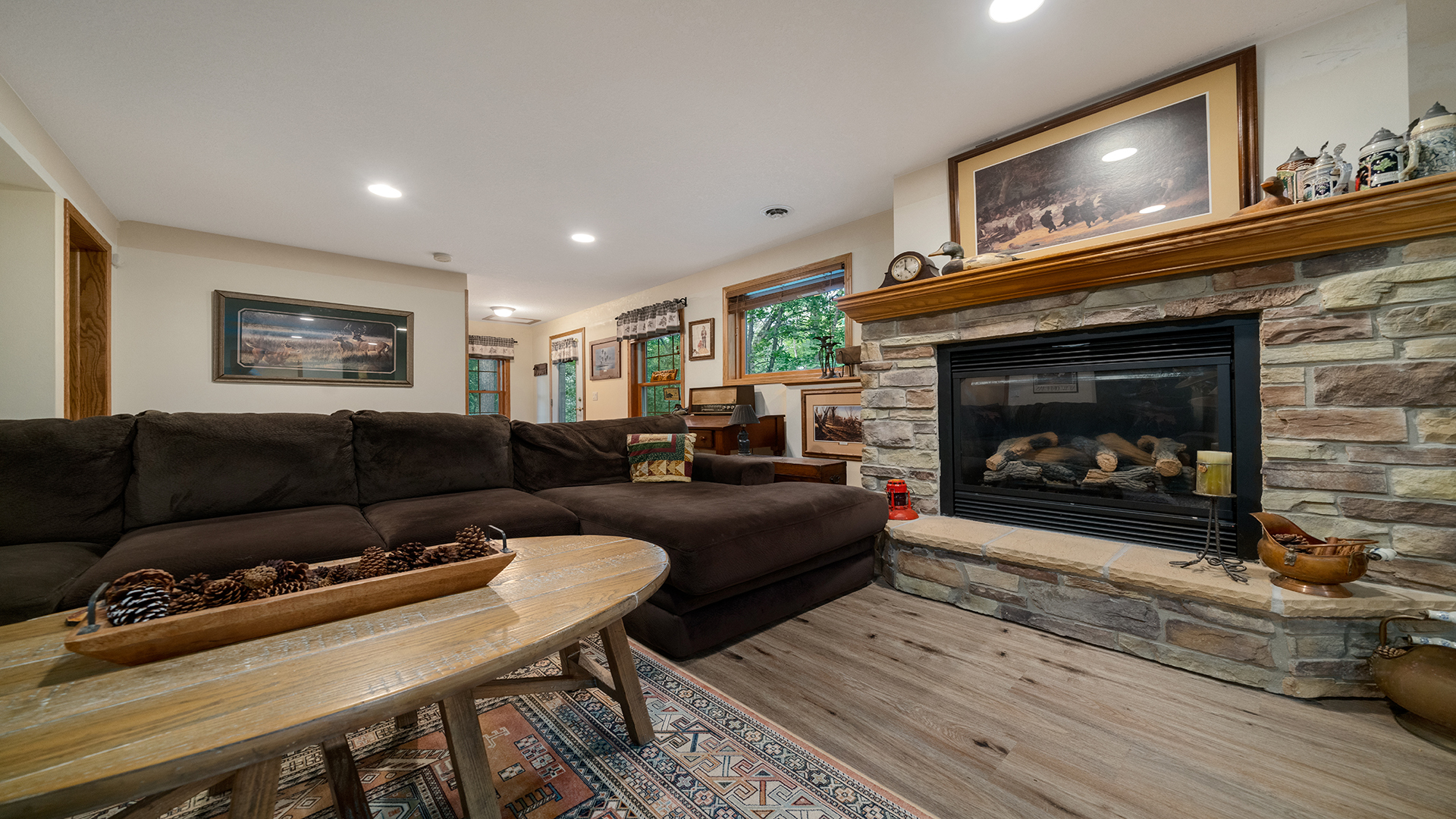 2162 Fawn Ridge Road Dixon, IL 61021 - Photo 30 of 53 a living room with furniture and a fireplace