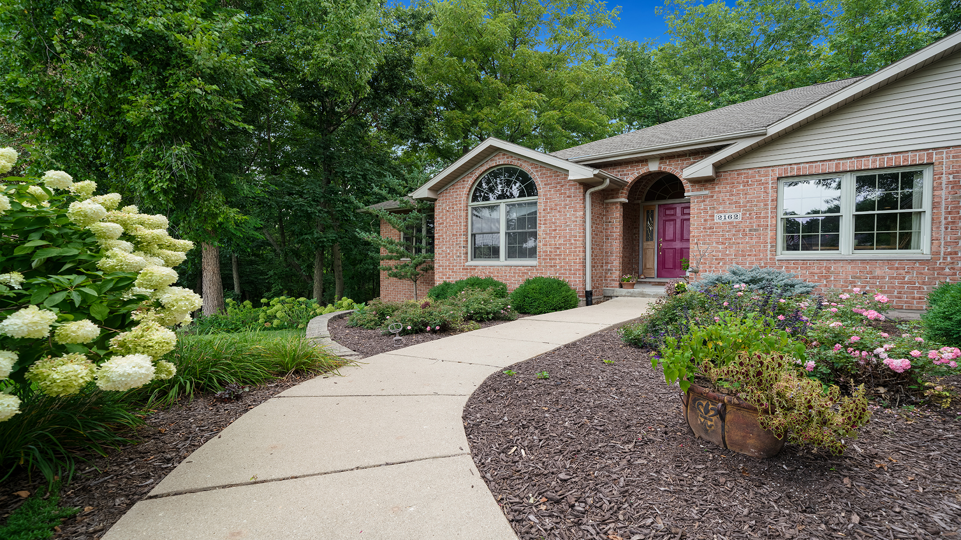 2162 Fawn Ridge Road Dixon, IL 61021 - Photo 4 of 53 a front view of a house with a yard