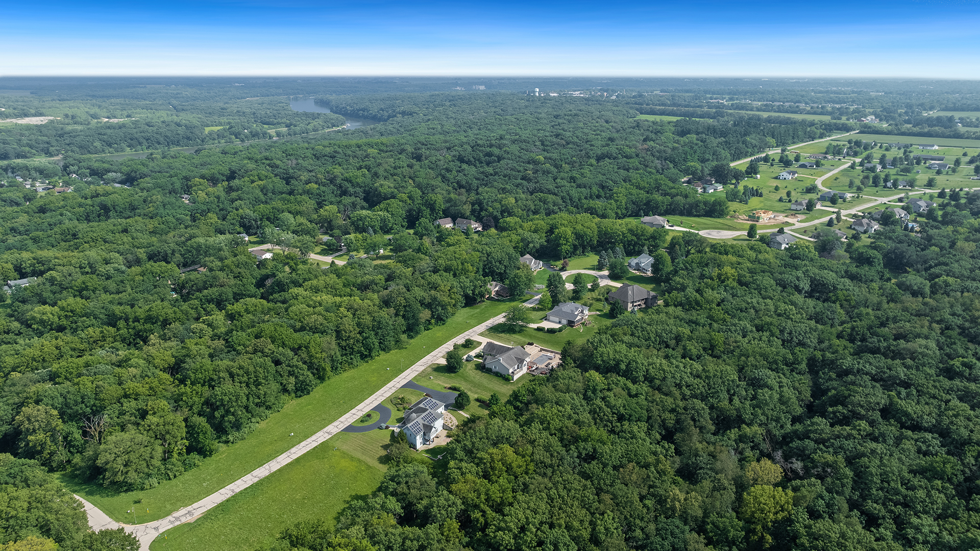 2162 Fawn Ridge Road Dixon, IL 61021 - Photo 6 of 53 an aerial view of residential houses with outdoor space and trees