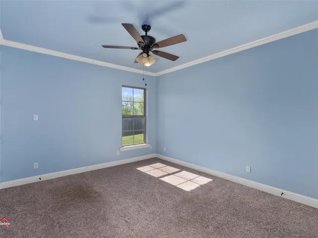 a bathroom with a granite countertop sink toilet and a mirror