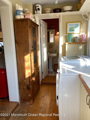 a view of a kitchen from the hallway