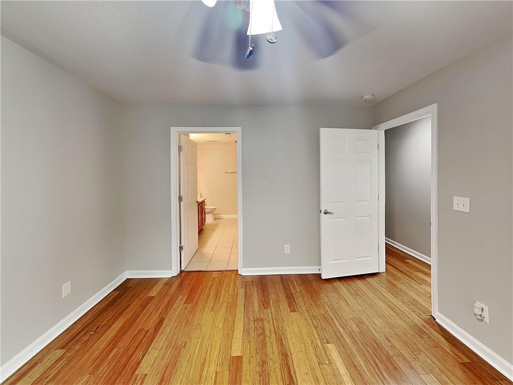 1020 Camelot Drive Atlanta, GA 30349 - Photo 9 of 17 a view of a room with wooden floor