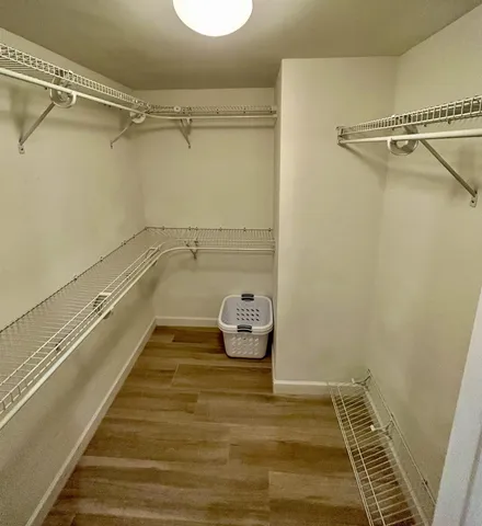 a bathroom with a sink double vanity and a mirror