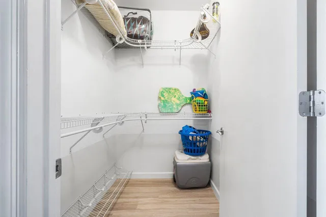 a view of swimming pool with outdoor seating and city view
