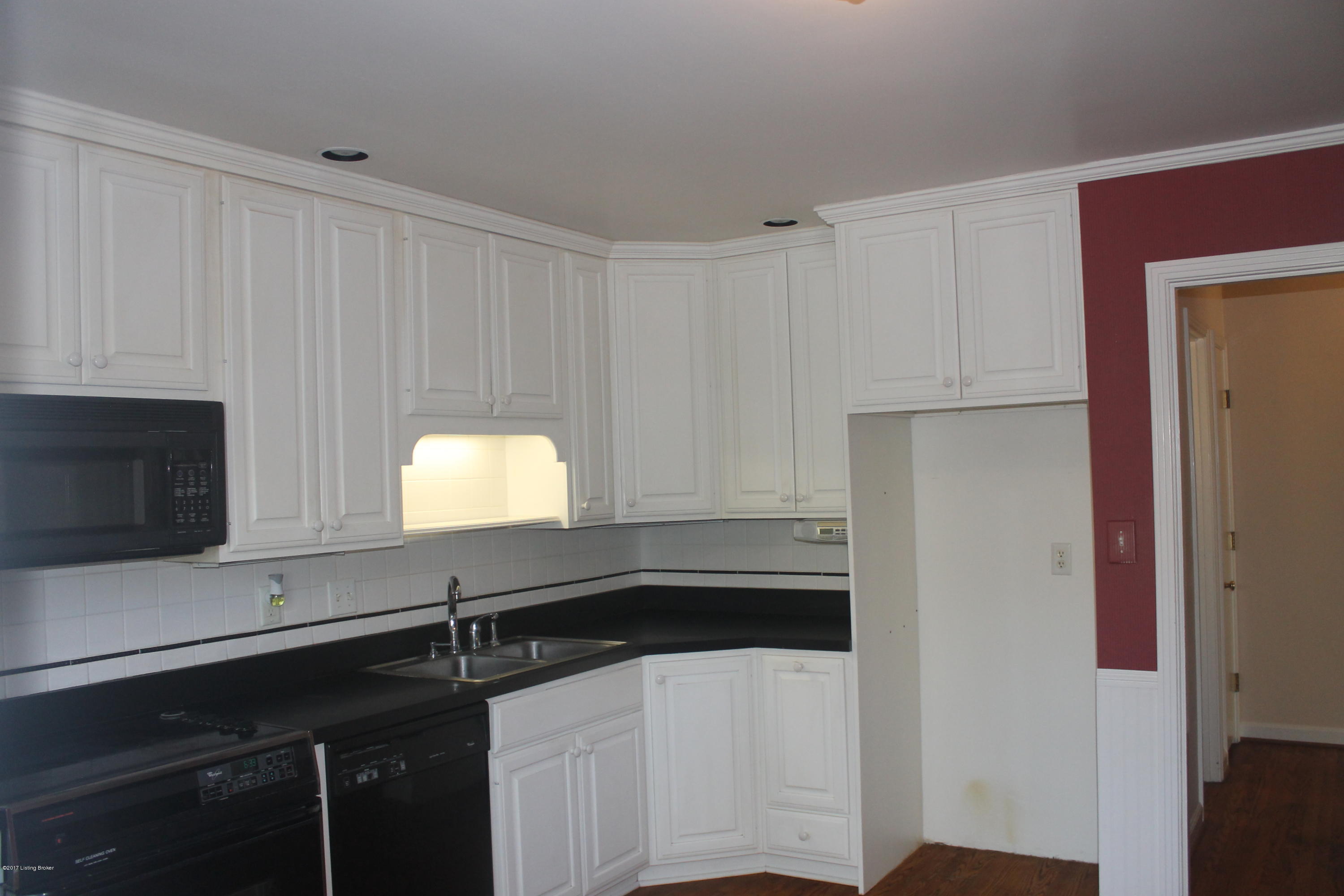 8615 Holston Road Louisville, KY 40222 - Photo 8 of 27 Kitchen to hallway.