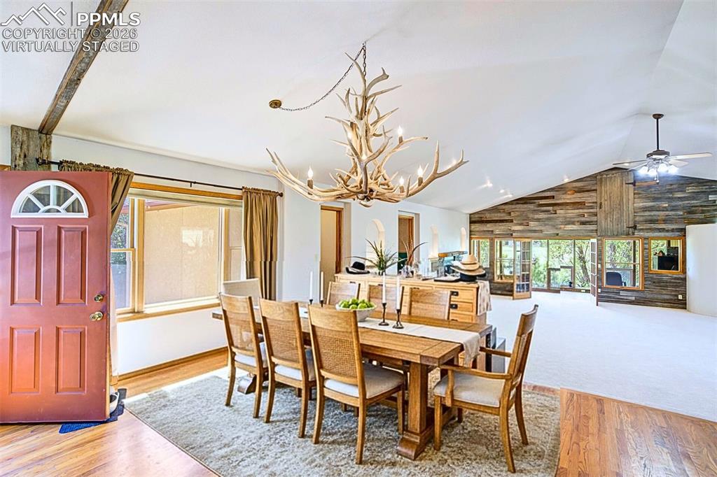 2550 Slocum Road Peyton, CO 80831 - Photo 11 of 49 a view of a dining room with furniture window and wooden floor