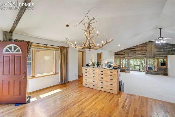 a view of a living room and window