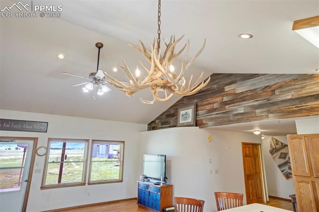 2550 Slocum Road Peyton, CO 80831 - Photo 15 of 49 a view of a room with a window and chandelier