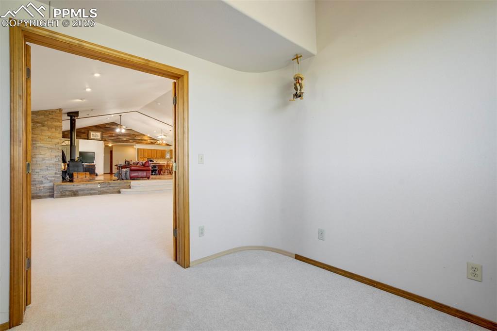 2550 Slocum Road Peyton, CO 80831 - Photo 32 of 49 an empty room with a glass door
