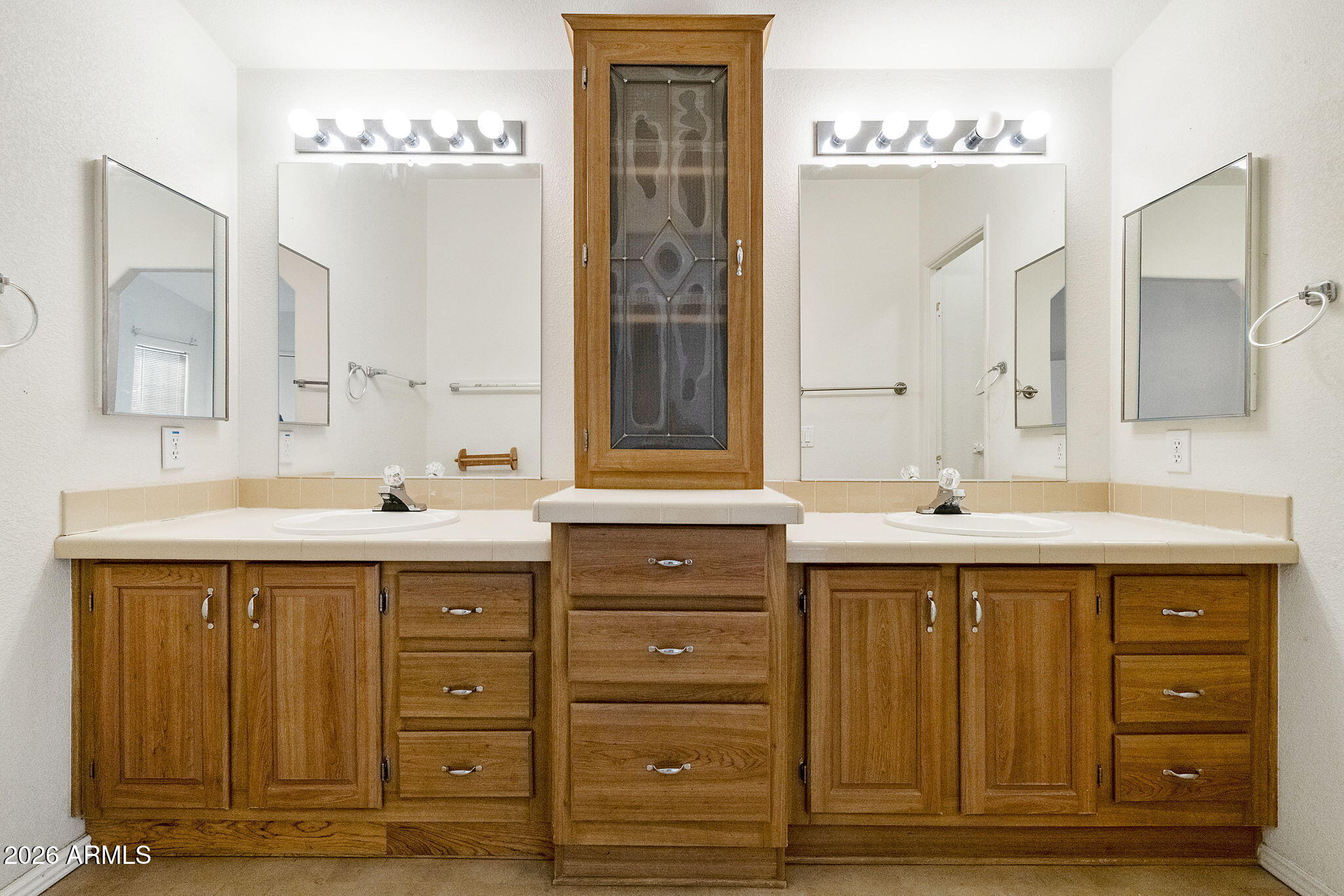 3700 South Tomahawk Road, Unit 73 Apache Junction, AZ 85119 - Photo 14 of 49 a bathroom with a sink and a mirror