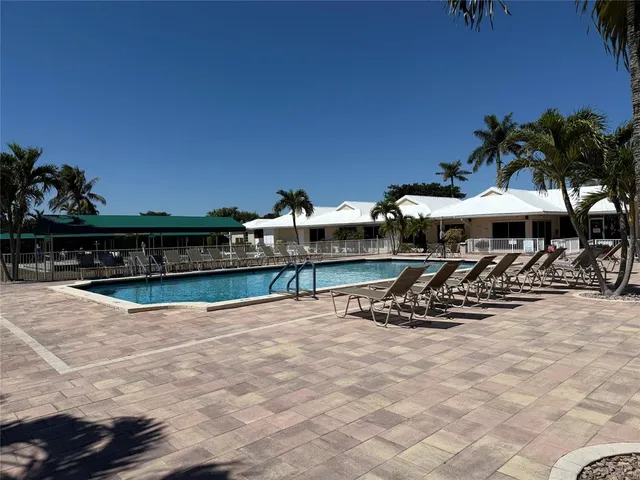 a view of a terrace with chairs