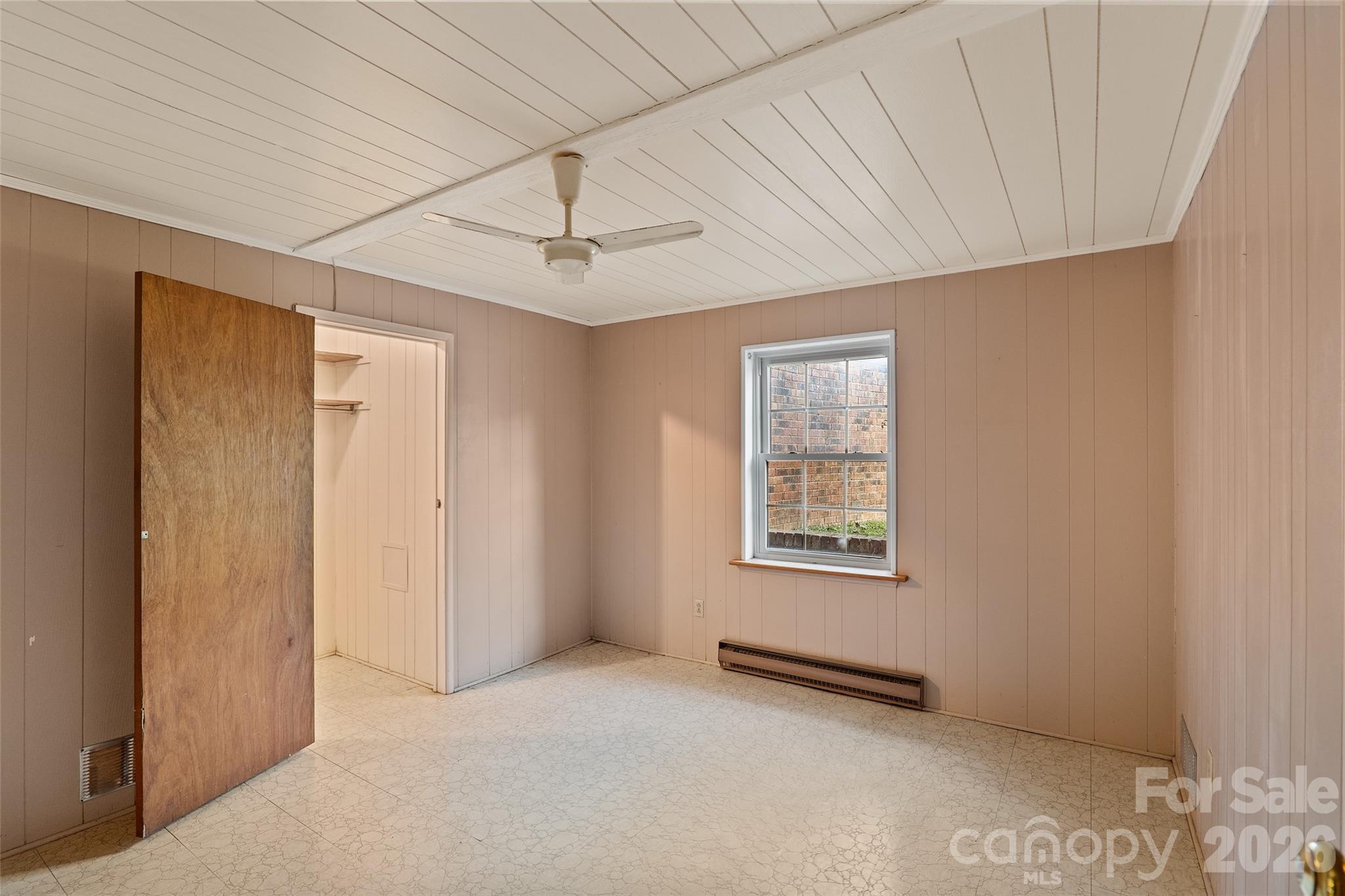 591 Landrum Road Tryon, NC 28782 - Photo 40 of 48 a view of an empty room with a window