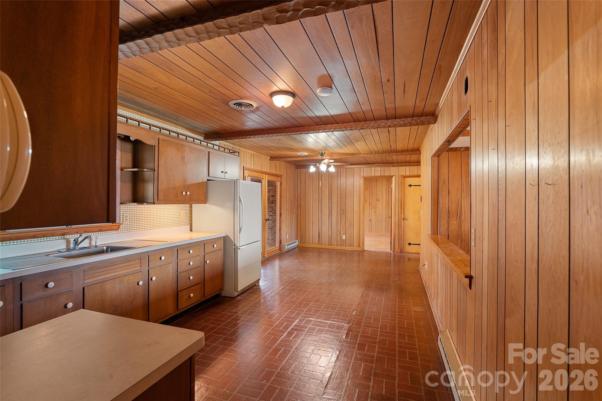591 Landrum Road Tryon, NC 28782 - Photo 48 of 48 a bathroom with a sink a mirror and a bathtub