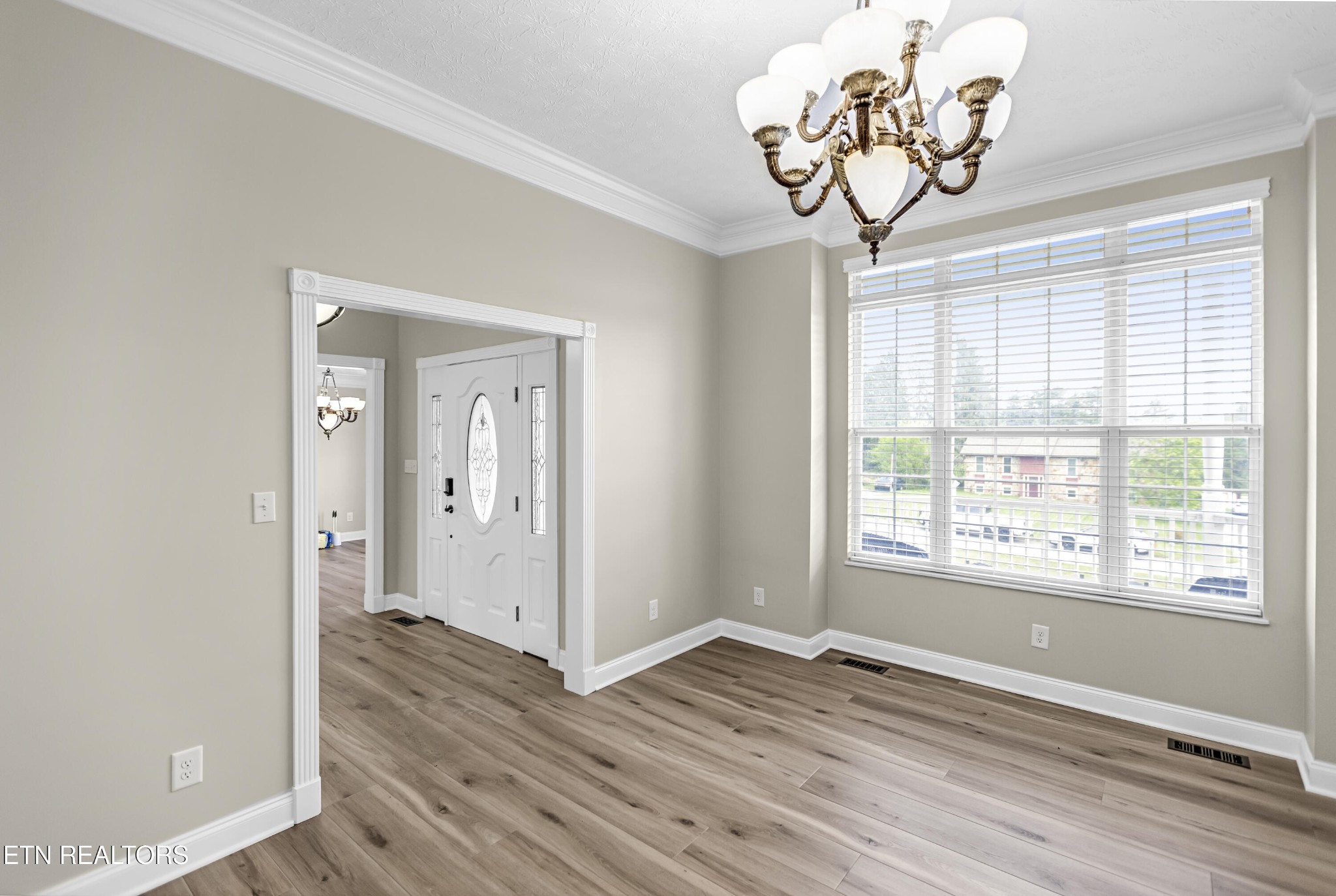 117 Mayview Drive Powell, TN 37849 - Photo 3 of 56 a view of an entryway with wooden floor