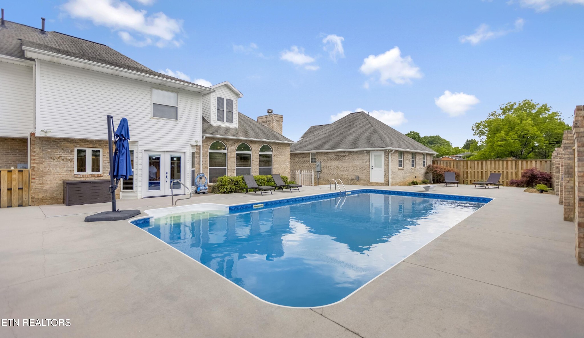 117 Mayview Drive Powell, TN 37849 - Photo 45 of 56 a view of a house with swimming pool and sitting area