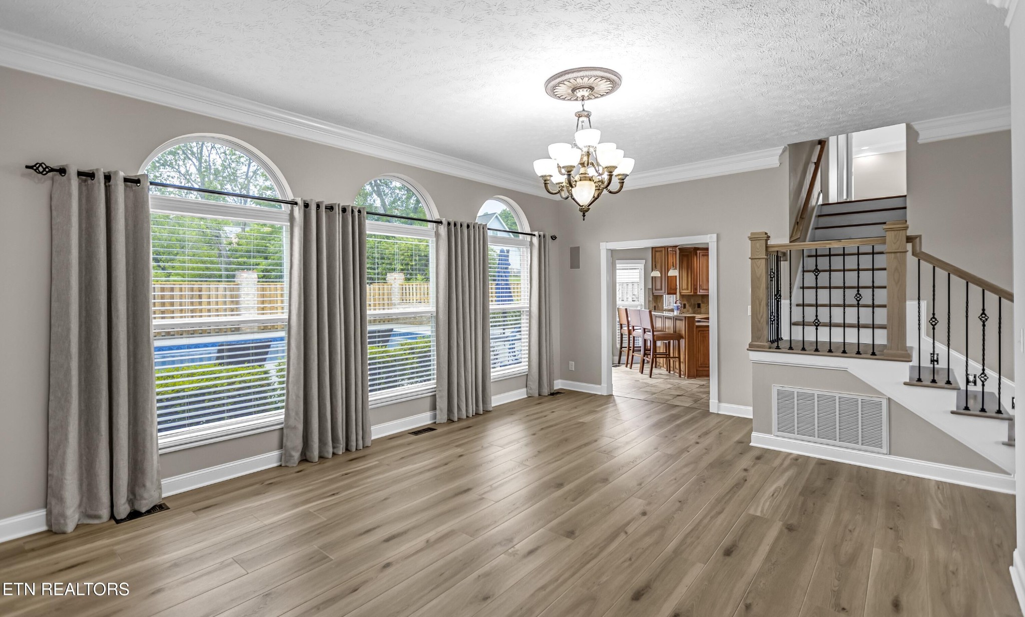 117 Mayview Drive Powell, TN 37849 - Photo 10 of 56 a view of a livingroom with wooden floor and windows