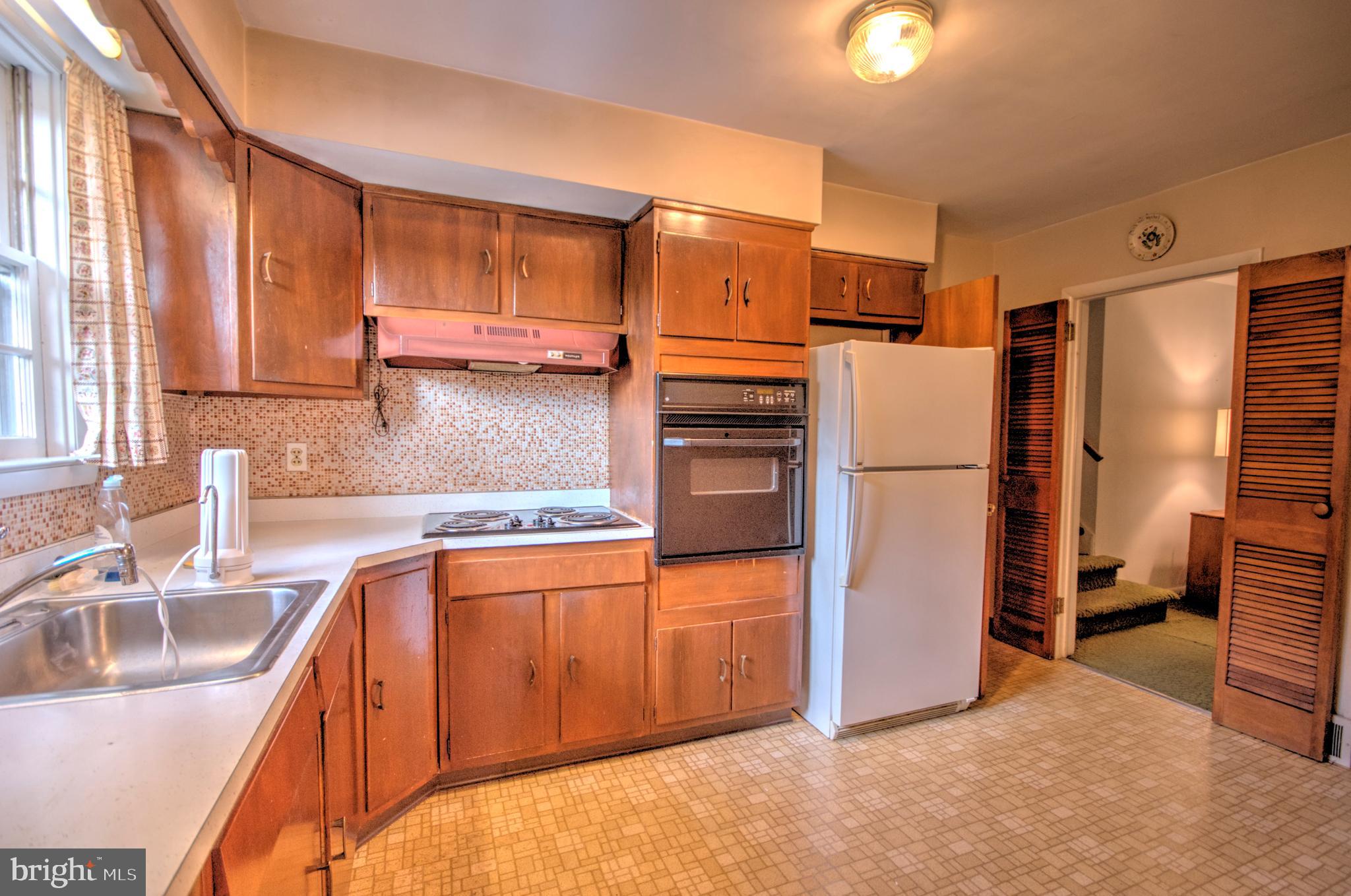 683 Mallard Road Wayne, PA 19087 - Photo 5 of 16 a kitchen with stainless steel appliances granite countertop a refrigerator and a sink