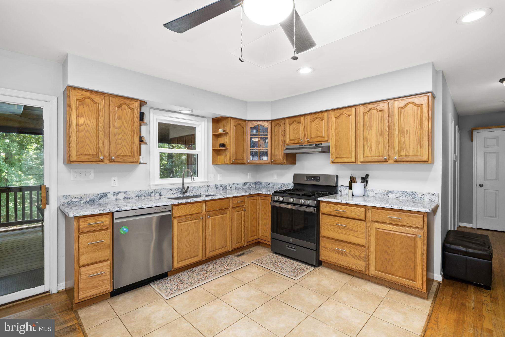 247 Bootons Lane Orange, VA 22960 - Photo 13 of 47 Open kitchen with ceiling fan lighting