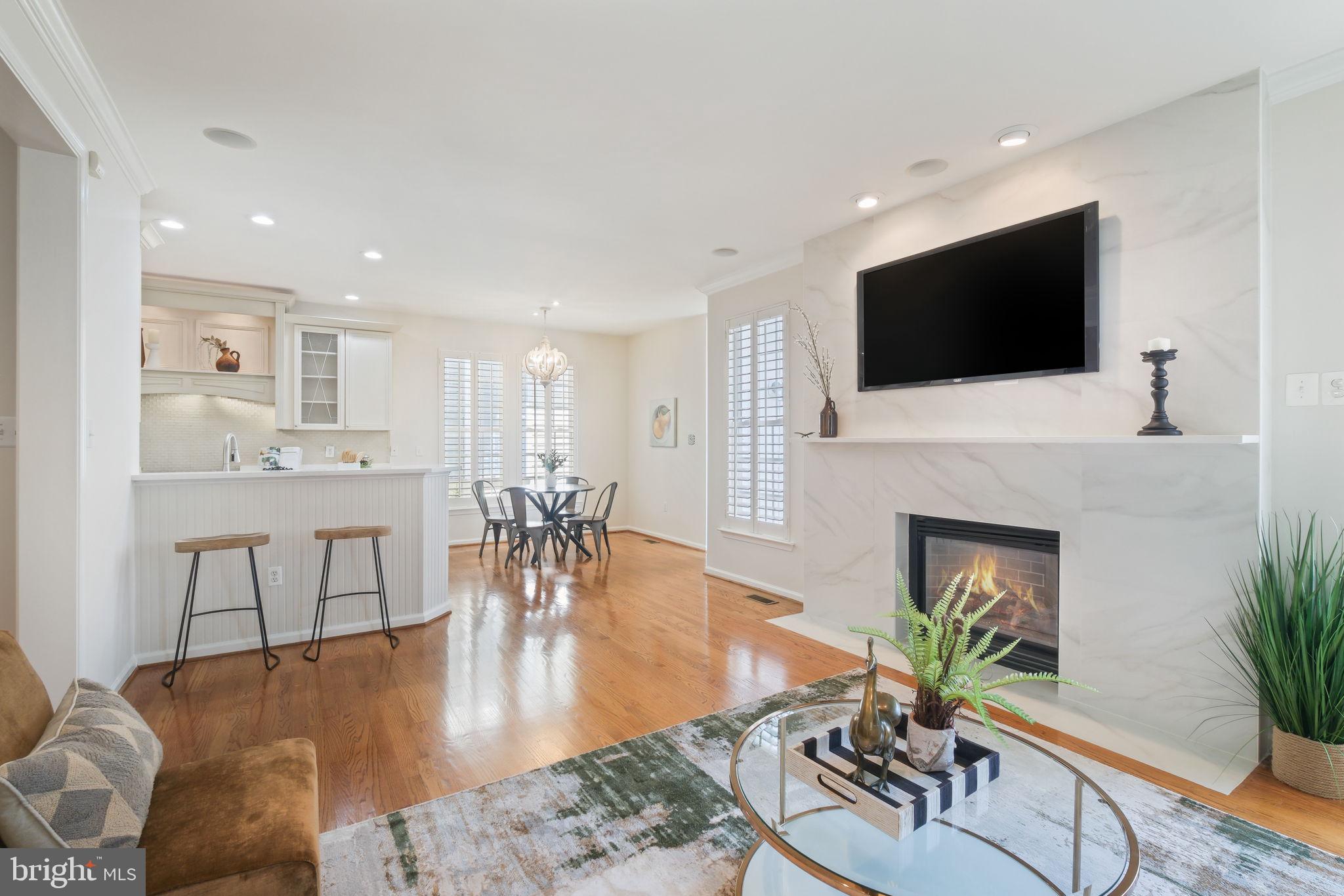 520 Kersten Street Gaithersburg, MD 20878 - Photo 21 of 63 a living room with furniture and a flat screen tv