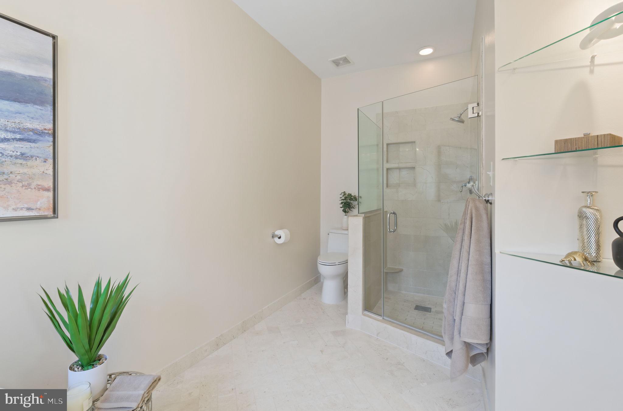 520 Kersten Street Gaithersburg, MD 20878 - Photo 27 of 63 a bathroom with a shower and a sink