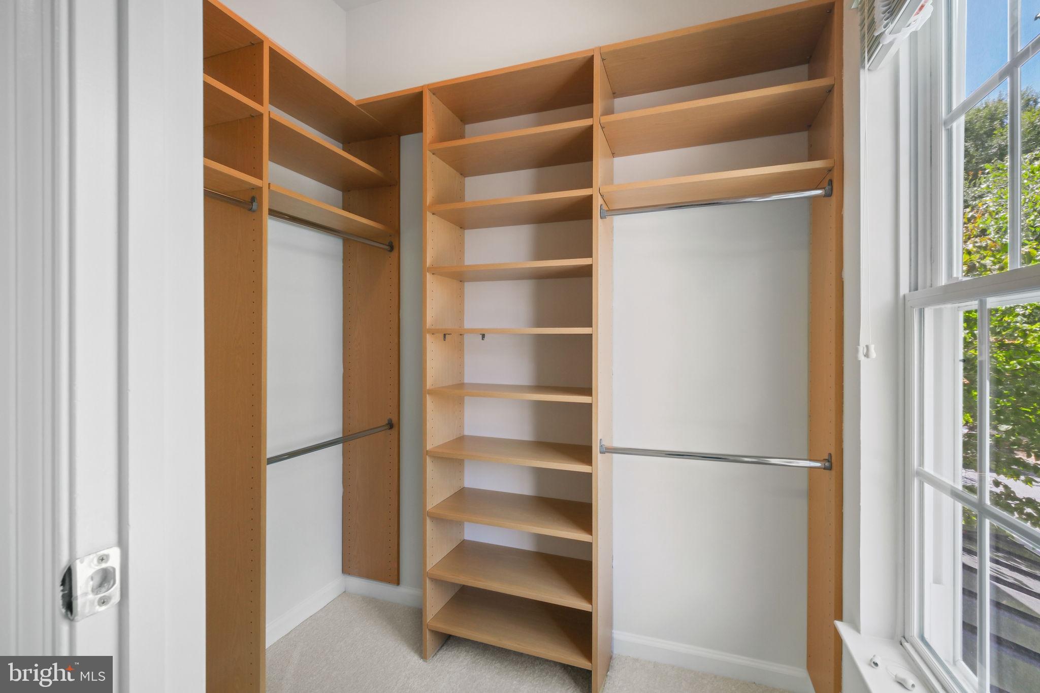 520 Kersten Street Gaithersburg, MD 20878 - Photo 29 of 63 a view of walk in closet with empty racks