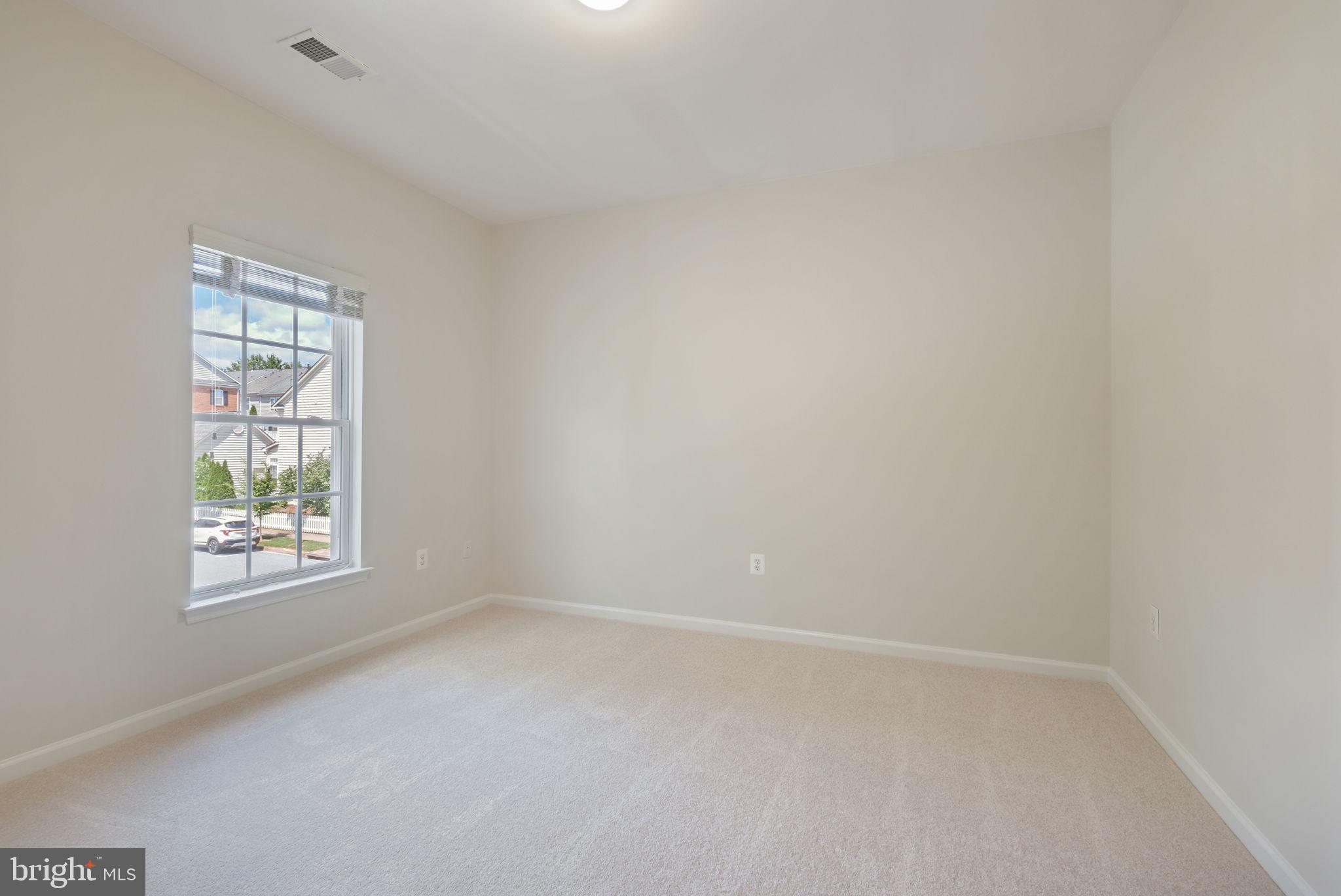 520 Kersten Street Gaithersburg, MD 20878 - Photo 30 of 63 an empty room with a window