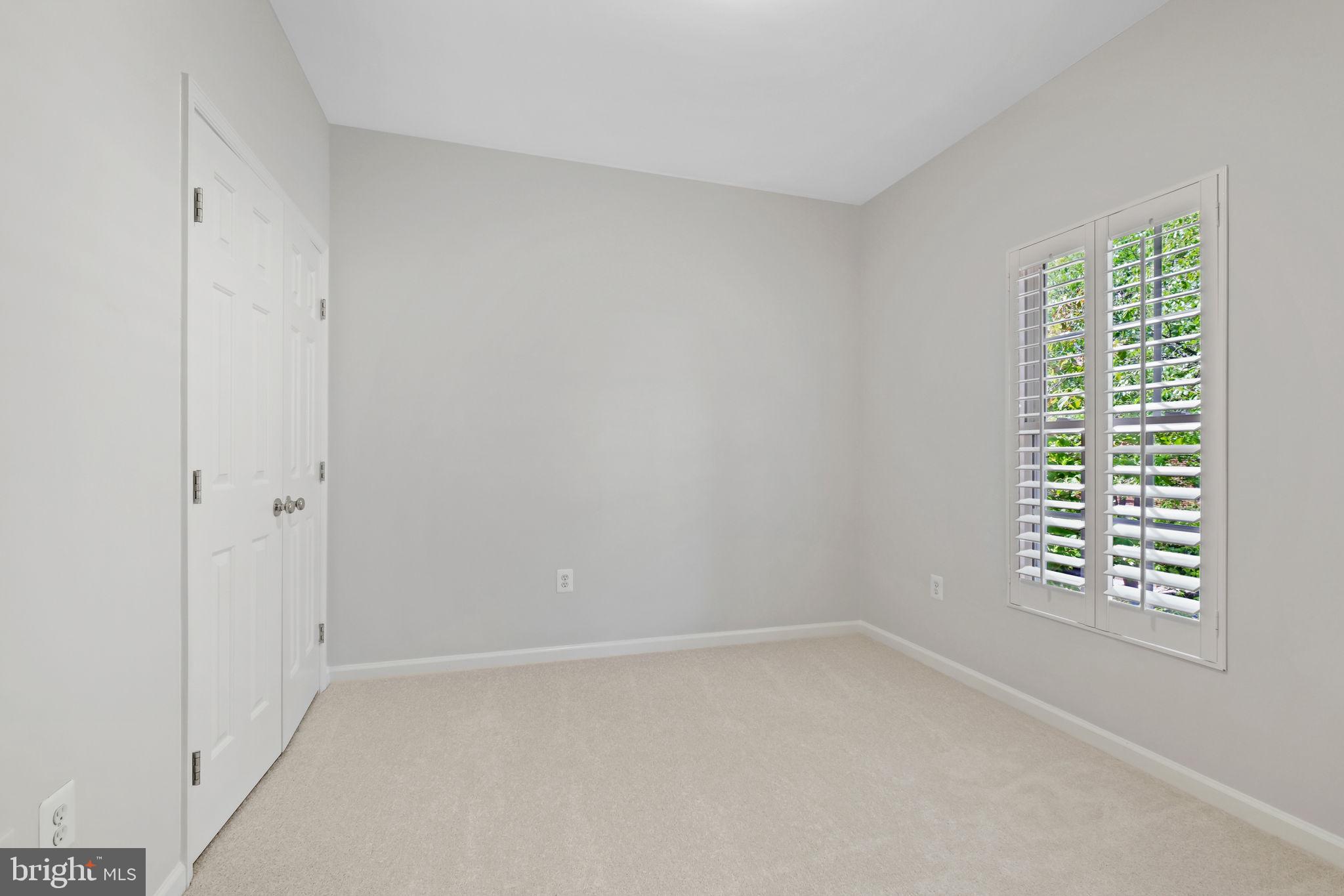 520 Kersten Street Gaithersburg, MD 20878 - Photo 31 of 63 a view of an empty room with a window