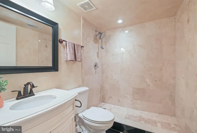 a view of a house with wooden deck