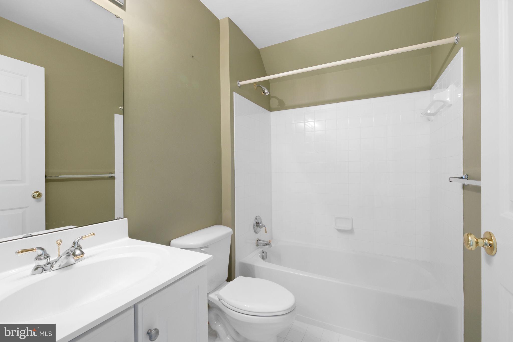 520 Kersten Street Gaithersburg, MD 20878 - Photo 43 of 63 a bathroom with a sink toilet and shower