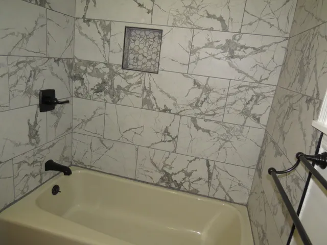 a bathroom with a bathtub