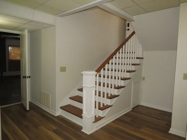 a view of entryway with wooden floor