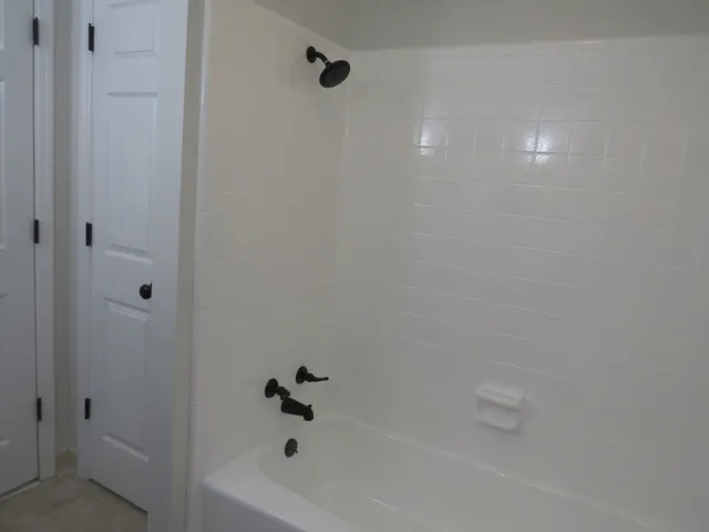 a bathroom with a bathtub