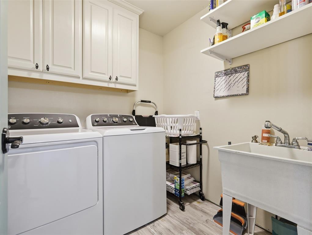 3823 State Highway Bonham, TX 75418 - Photo 19 of 37 a room with storage and utility