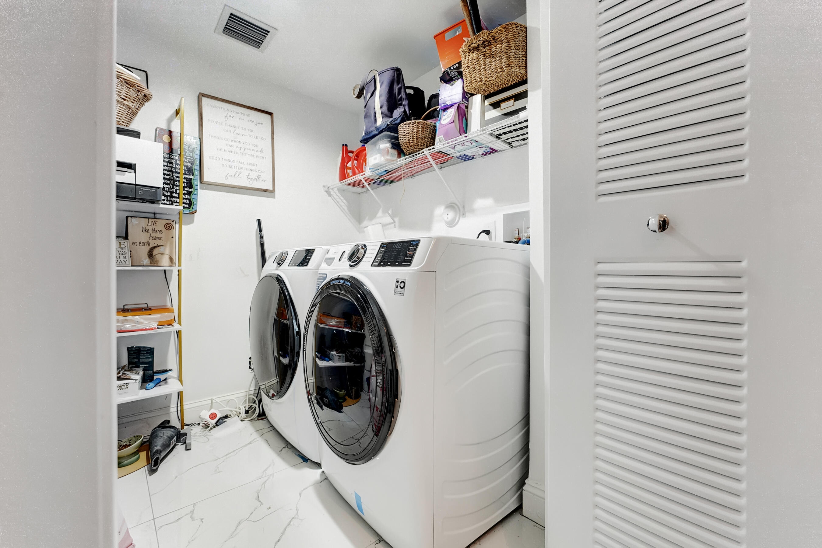 250 West Hidden Valley Boulevard, Unit 3 Boca Raton, FL 33487 - Photo 20 of 27 a utility room with dryer and washer