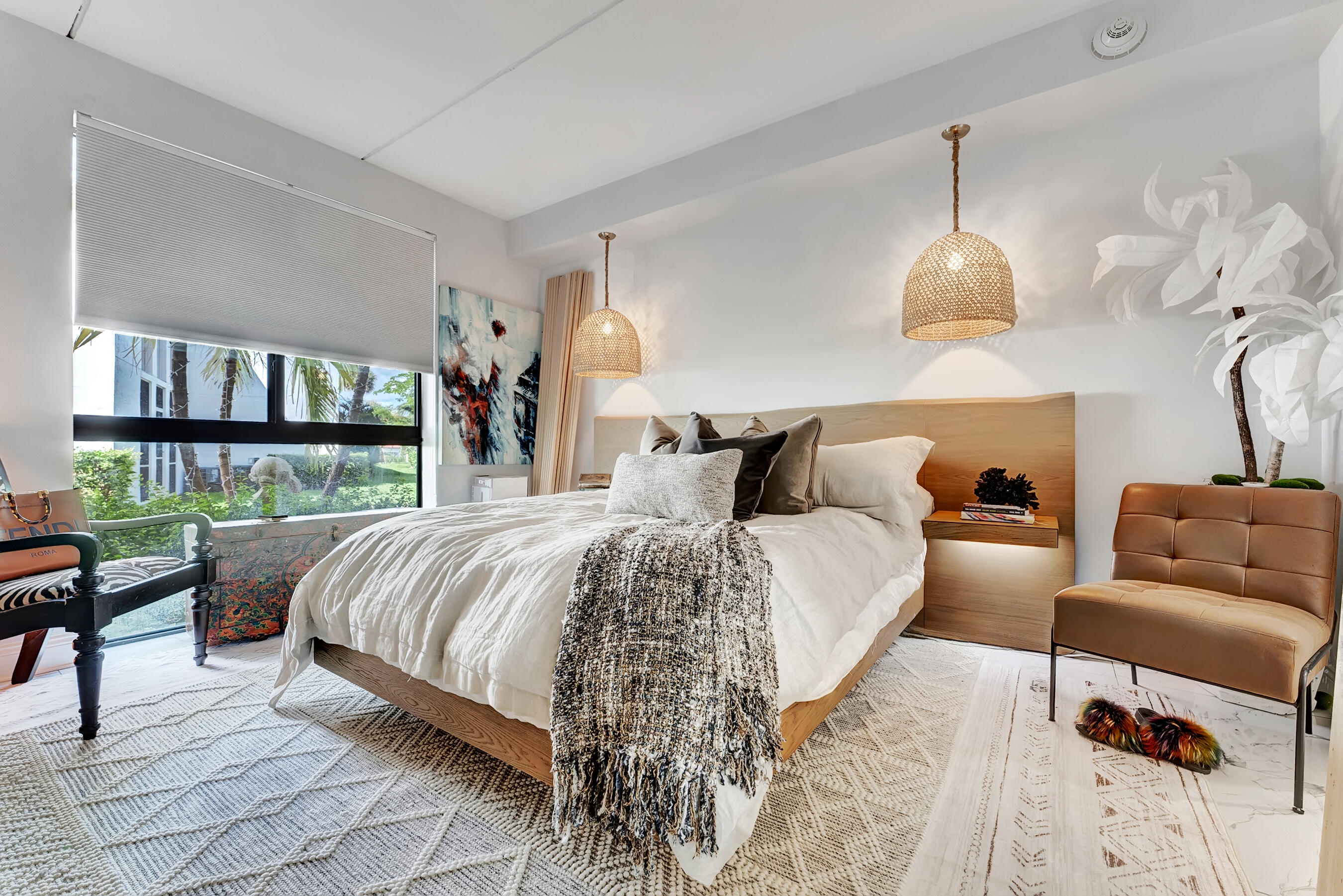 250 West Hidden Valley Boulevard, Unit 3 Boca Raton, FL 33487 - Photo 9 of 27 a bedroom with bed and a window