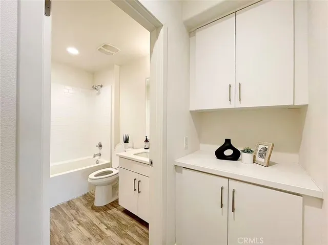 a view of a bathroom with a sink and a bath tub