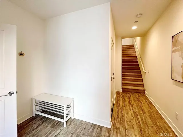 a view of outdoor space with wooden floor